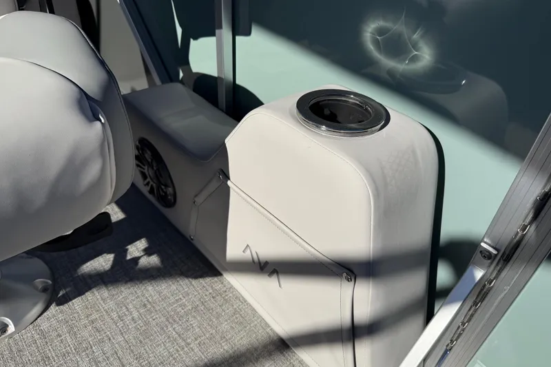 Slide: The Image of 2026 Avalon LSZ Versatile Rear Bench interior with cup holder and speaker. - 45