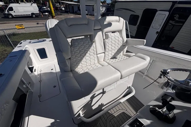 Slide: The Image of 2026 Tidewater 302 CC Adventure boat with luxurious seating and modern design. - 37