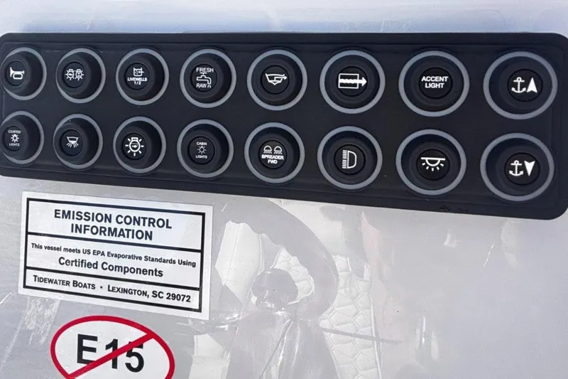 Slide: The Image of Control panel of 2026 Tidewater 302 CC Adventure boat with emission information label. - 41
