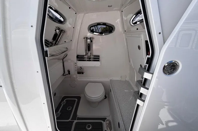Slide: The Image of 2026 Tidewater 302 CC Adventure boat interior with modern bathroom amenities. - 50
