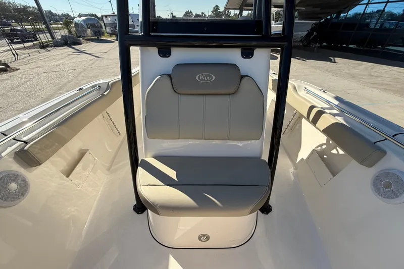Slide: The Image of 2022 Key West 239 FS boat interior with seating and speakers. - 12
