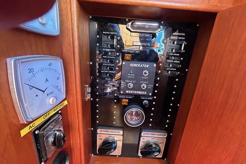 Slide: The Image of Electrical control panel on a 1986 Grand Banks 42 Classic boat. - 36