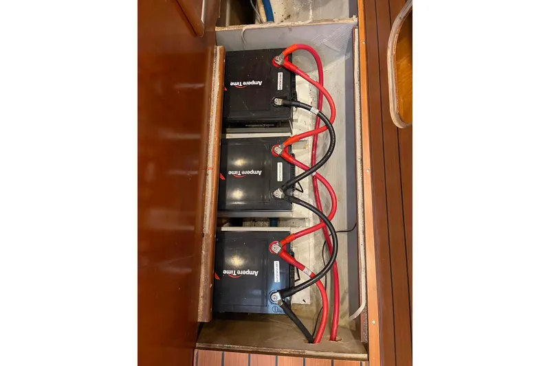 Slide: The Image of Battery compartment of 2003 Lagoon 410-S2 with Ampere Time batteries and wiring. - 26