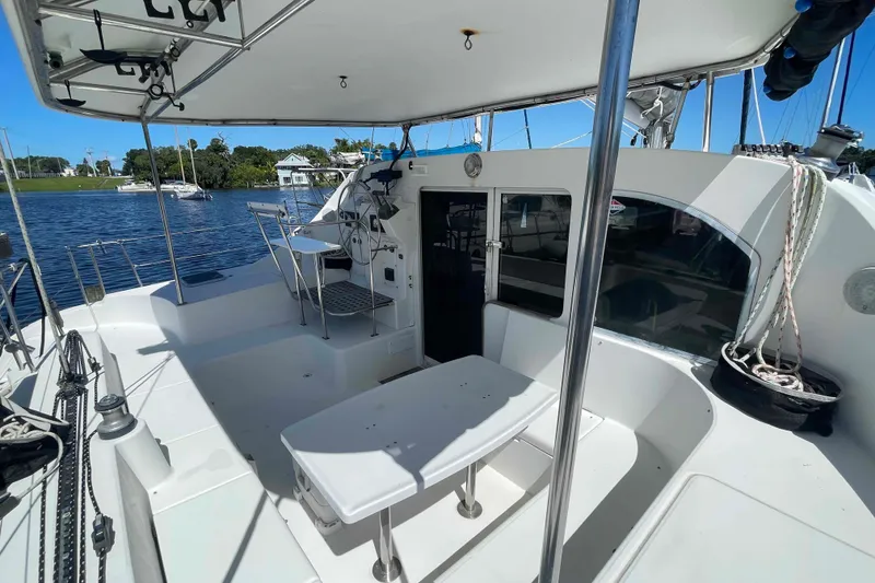 Slide: The Image of Renogy solar panel label on Lagoon 410-S2, 2003 model, showing specifications and warnings. - 67