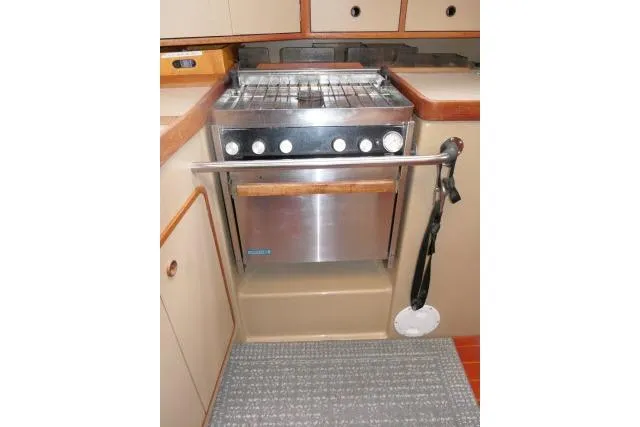 Slide: The Image of 1989 C&C 37/40+ yacht kitchen with stainless steel stove and oven. - 21