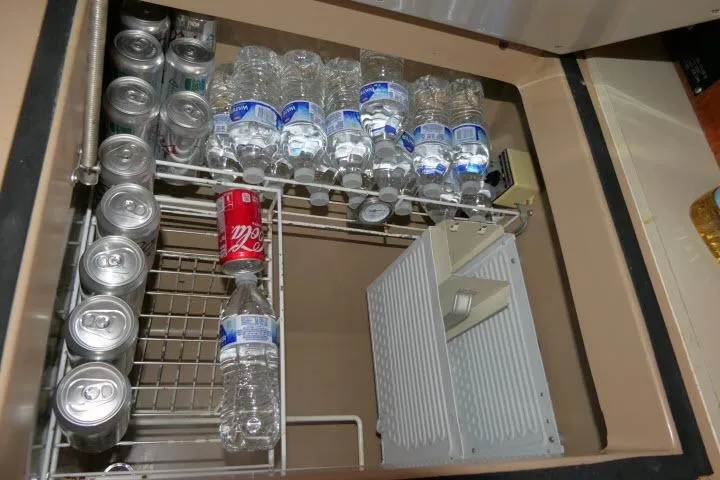 Slide: The Image of Refrigerator stocked with water bottles and soda cans on a C&C 37/40+ sailboat, 1989 model. - 22