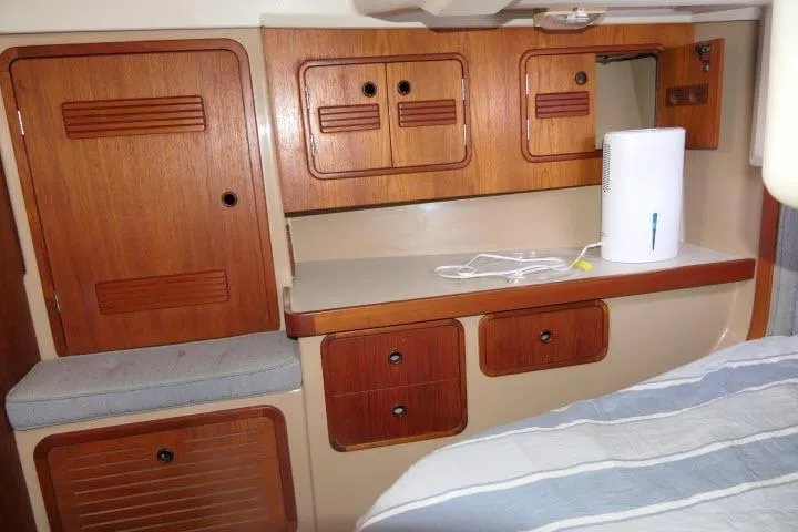 Slide: The Image of 1989 C&C 37/40+ yacht interior with wooden cabinets and countertop. - 30
