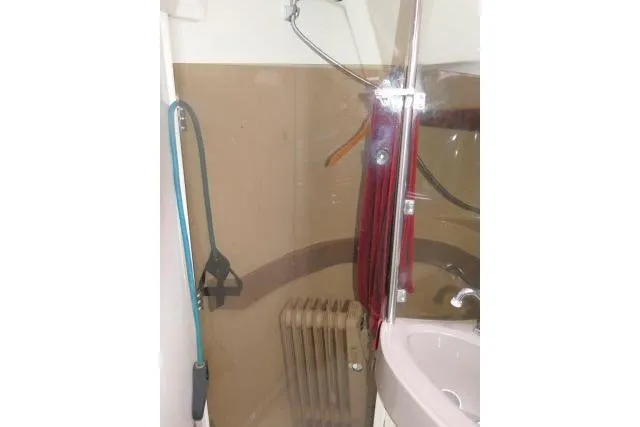 Slide: The Image of 1989 C&C 37/40+ yacht bathroom with sink, mirror, and shower equipment. - 35