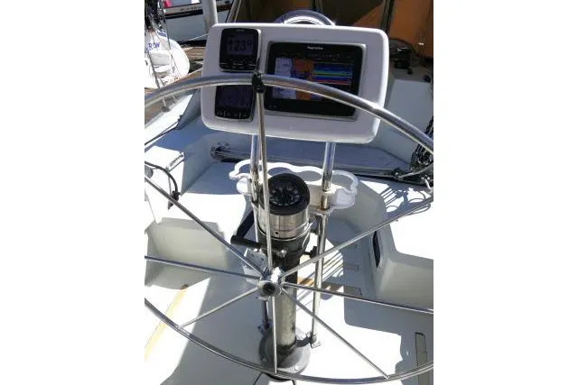 Slide: The Image of Steering wheel and navigation system on 1989 C&C 37/40+ sailboat. - 39