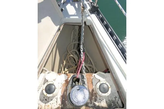 Slide: The Image of Anchor chain and ropes on 1989 C&C 37/40+ sailboat deck. - 52