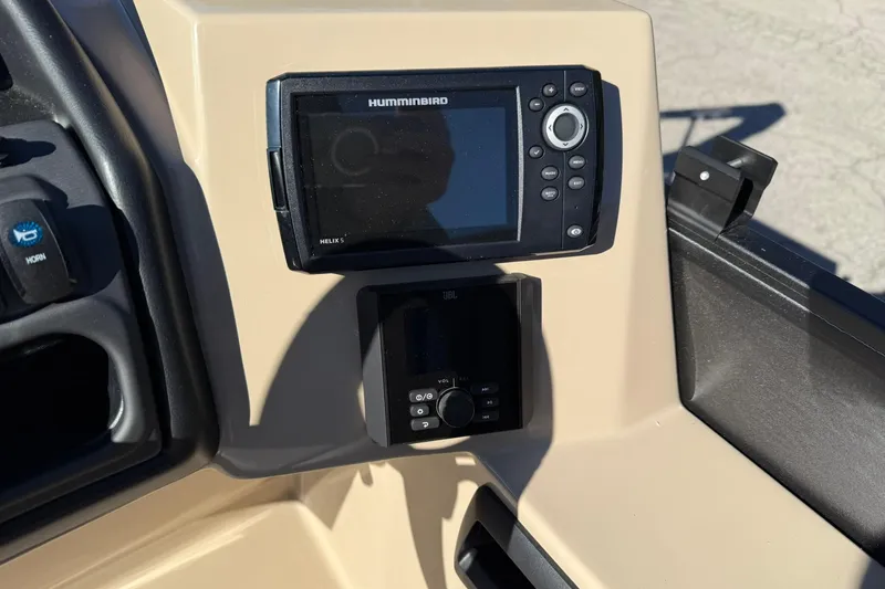 Slide: The Image of Control panel of 2026 Bentley Pontoons Legacy 243 Navigator with Humminbird Helix 5 display. - 10