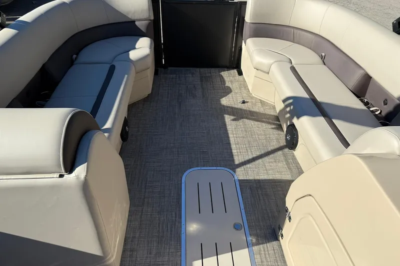 Slide: The Image of 2026 Bentley Pontoons Legacy 243 Navigator interior with spacious seating and modern design. - 14
