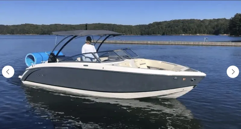 The Image of 2021 Cobalt R7 boat on a calm lake. - 0