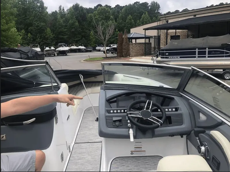 Slide: The Image of 2021 Cobalt R7 boat with luxurious interior and seating. - 7