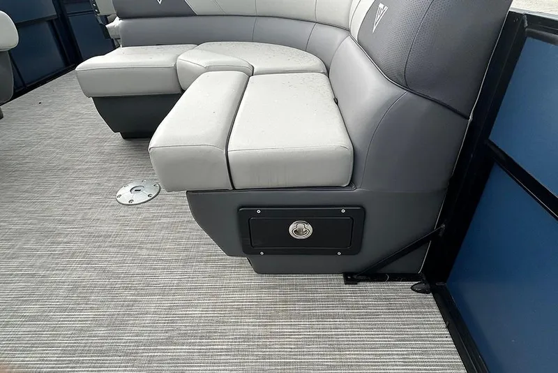 Slide: The Image of 2025 Viaggio Lago V-R boat interior with gray seating and storage compartment. - 21