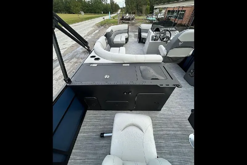 Slide: The Image of 2025 Viaggio Lago V-R boat interior with modern seating and steering console. - 26