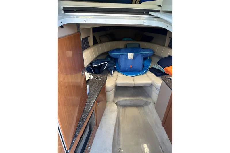 Slide: The Image of Interior of 2004 Formula 330 Sun Sport boat with seating and storage. - 18
