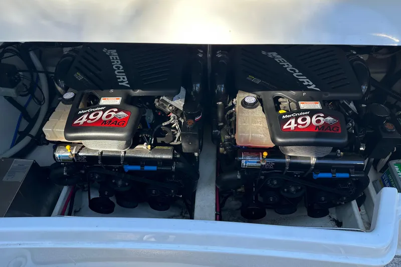 Slide: The Image of Twin MerCruiser 496 MAG engines in a 2004 Formula 330 Sun Sport boat. - 25