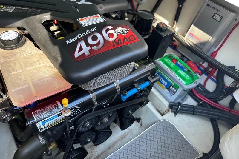 Slide: The Image of MerCruiser 496 MAG engine in 2004 Formula 330 Sun Sport boat, with battery and wiring. - 27