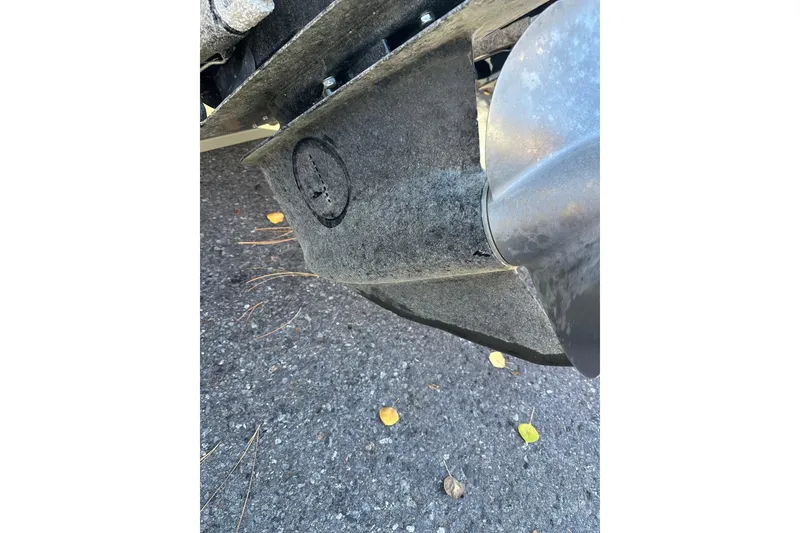 Slide: The Image of Close-up of a 2004 Formula 330 Sun Sport boat propeller on asphalt. - 31