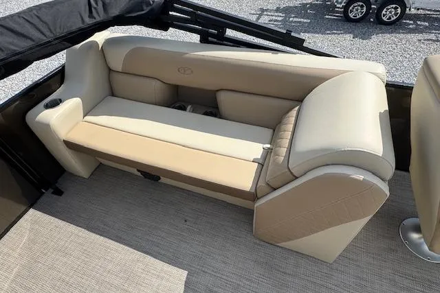 Slide: The Image of 2026 Veranda VISTA VIEW 22RC boat interior with beige seating and cup holders. - 10