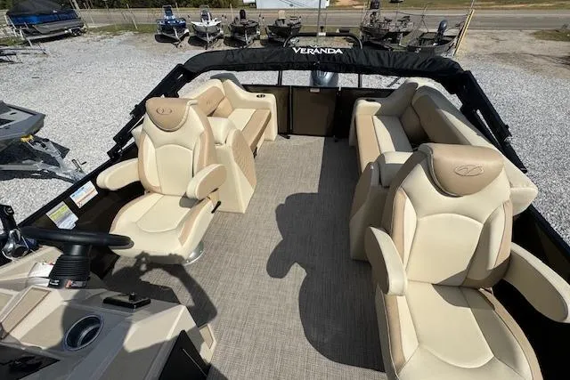Slide: The Image of 2026 Veranda VISTA VIEW 22RC pontoon boat with luxurious beige seating and spacious layout. - 12