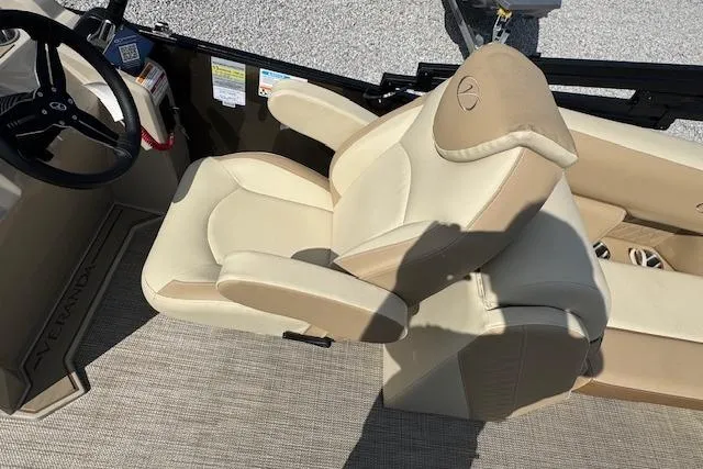 Slide: The Image of 2026 Veranda VISTA VIEW 22RC boat interior with beige captain's chair and steering console. - 8