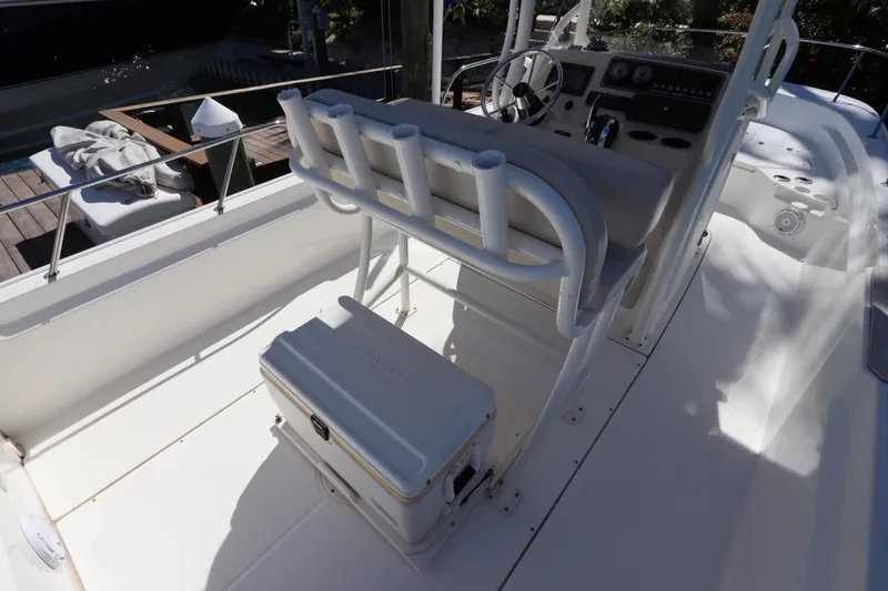 Slide: The Image of 2019 Boston Whaler 210 Montauk boat interior with steering console and seating. - 11