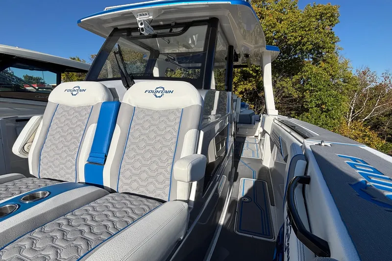 Slide: The Image of 2024 Fountain 38 SCX boat interior with stylish seating and modern design. - 16