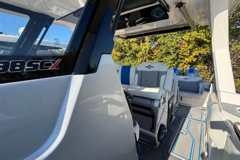 Slide: The Image of 2024 Fountain 38 SCX boat interior with luxurious seating and modern design. - 20