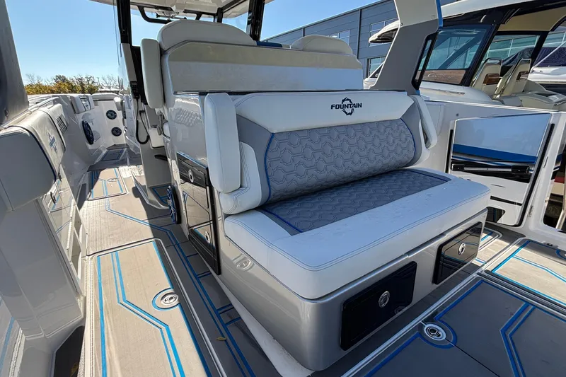 Slide: The Image of 2024 Fountain 38 SCX boat interior with stylish seating and modern design. - 24