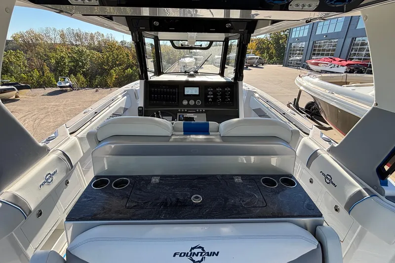 Slide: The Image of 2024 Fountain 38 SCX boat interior with modern dashboard and seating. - 27