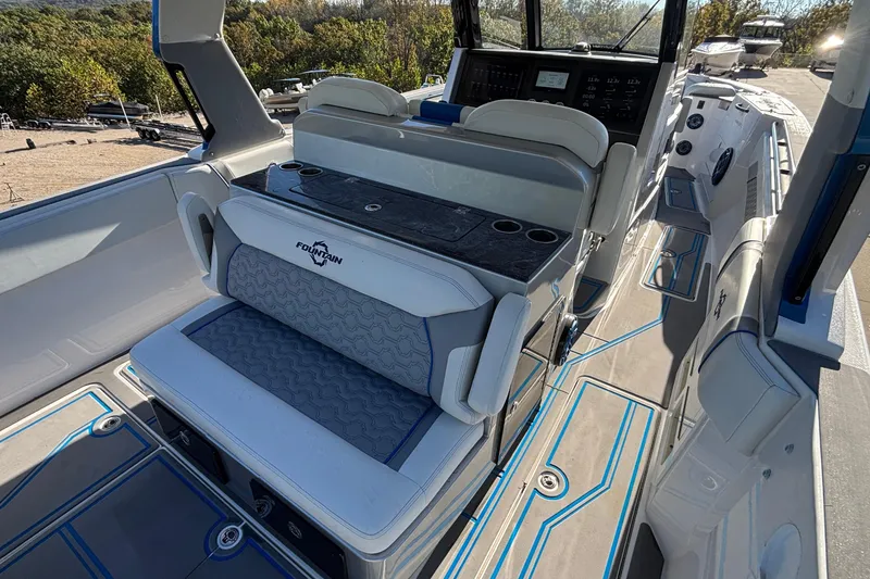 Slide: The Image of 2024 Fountain 38 SCX boat interior with modern seating and control panel. - 32