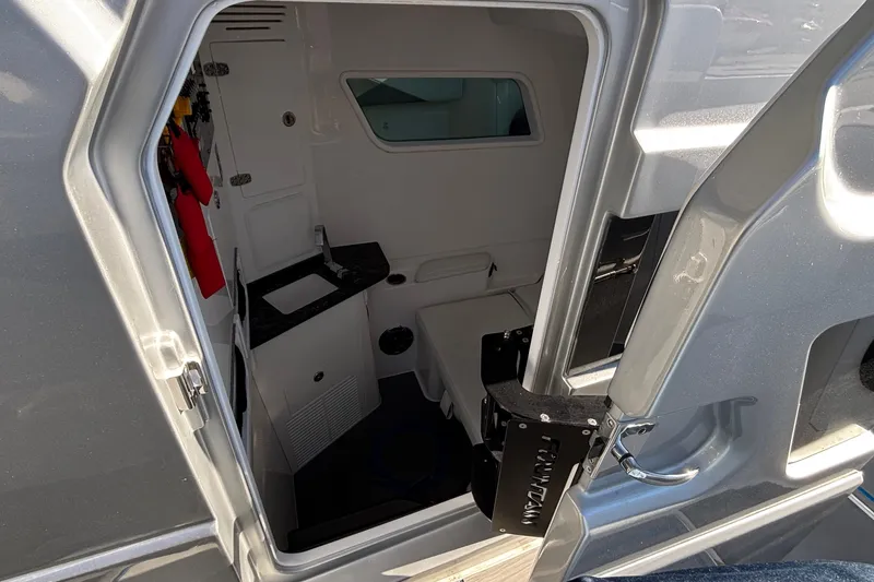 Slide: The Image of 2024 Fountain 38 SCX cabin interior with compact design and modern amenities. - 5