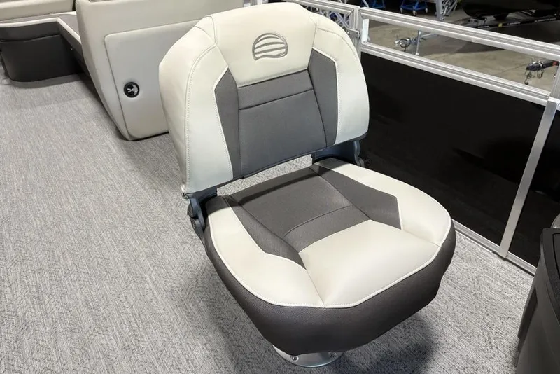 Slide: The Image of Control panel of 2026 Sun Tracker Fishin' Barge 22 DLX with various function buttons. - 13