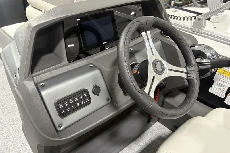 Slide: The Image of Throttle control of 2026 Sun Tracker Fishin' Barge 22 DLX with capacity warnings. - 19