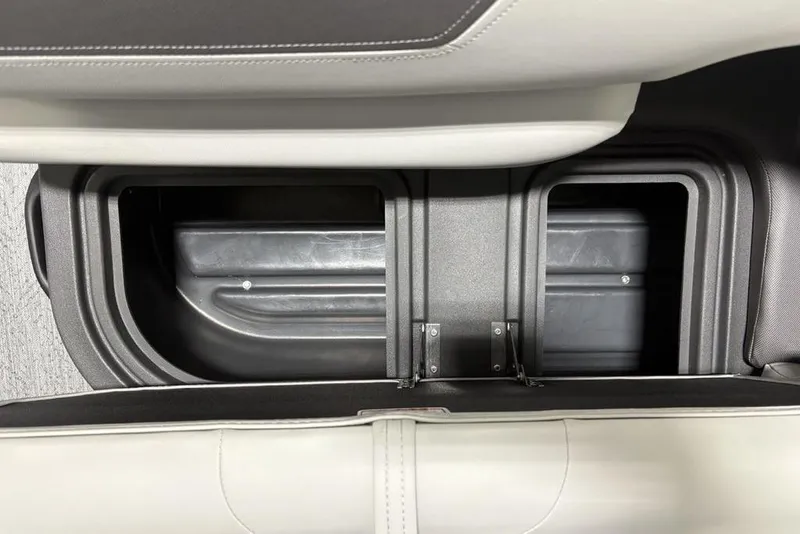 Slide: The Image of Storage compartment on 2026 Sun Tracker Fishin' Barge 22 DLX boat. - 26