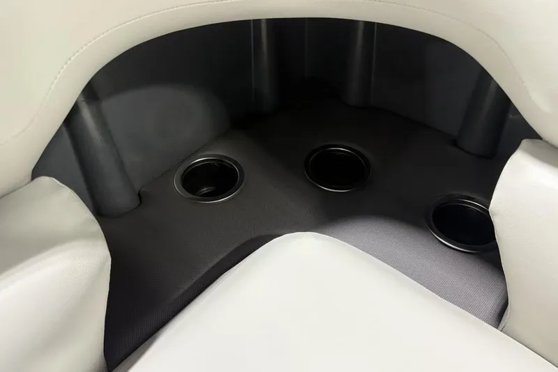 Slide: The Image of Open storage compartment on 2026 Sun Tracker Fishin' Barge 22 DLX boat. - 31