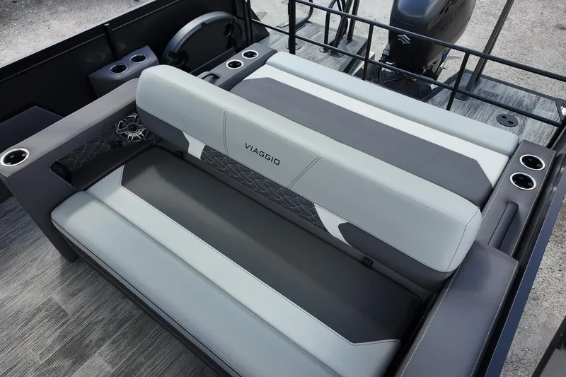 Slide: The Image of 2026 Viaggio Diamante 24S boat interior with gray seating and cup holders. - 14