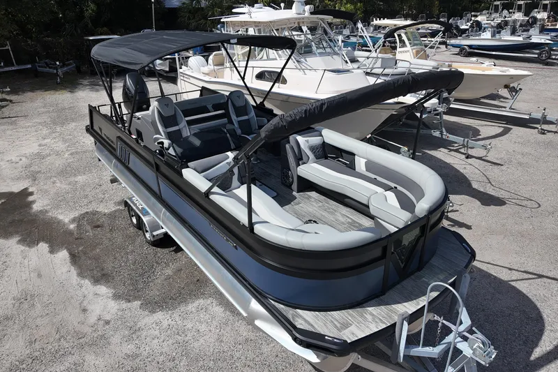 Slide: The Image of 2026 Viaggio Diamante 24S pontoon boat with sleek design and spacious seating. - 4