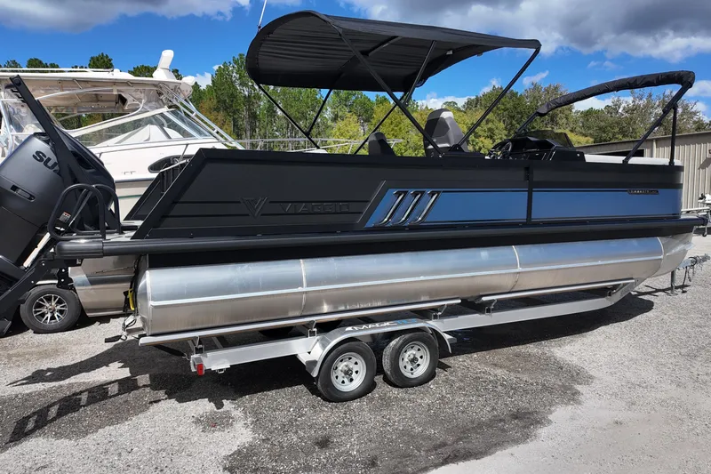 Slide: The Image of 2026 Viaggio Diamante 24S pontoon boat on trailer, featuring sleek design and canopy. - 5