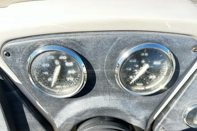 Slide: The Image of Dashboard of a 2016 Godfrey Sweetwater 2286 Pontoon with two analog gauges. - 3