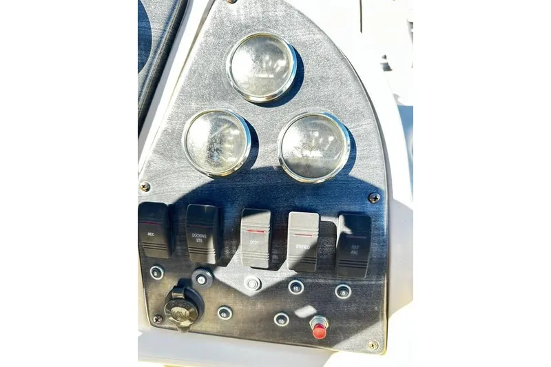 Slide: The Image of 2016 Godfrey Sweetwater 2286 Pontoon dashboard with switches and gauges. - 5