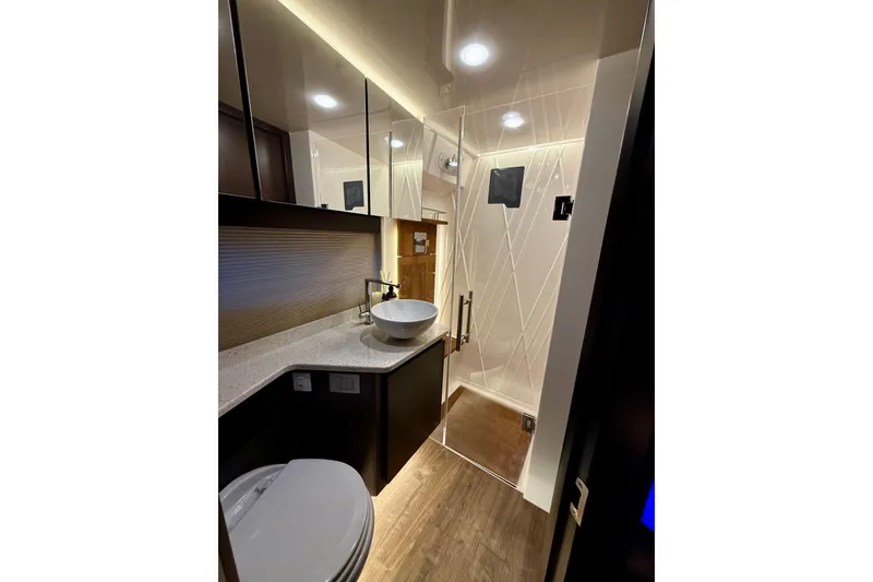 Slide: The Image of Interior of 2018 Regal 42 Grande Coupe with cozy seating and stylish decor. - 14