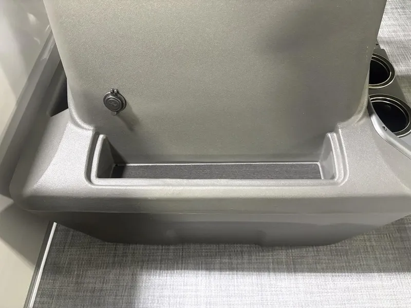 Slide: The Image of 2026 Sun Tracker PARTY BARGE® 16 DLX console with cup holders and storage compartment. - 14