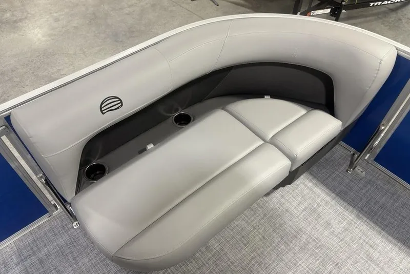 Slide: The Image of 2026 Sun Tracker Party Barge 16 DLX pontoon seating with cup holders and sleek design. - 12