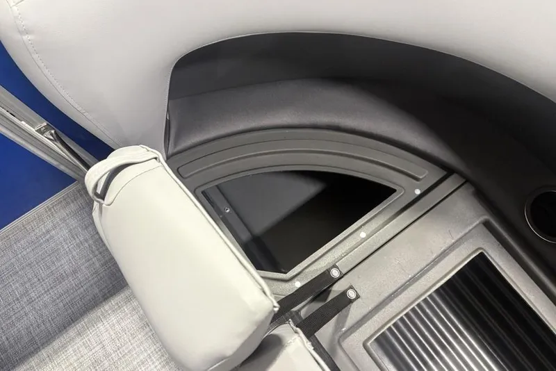Slide: The Image of Storage compartment on 2026 Sun Tracker Party Barge 16 DLX pontoon boat. - 2