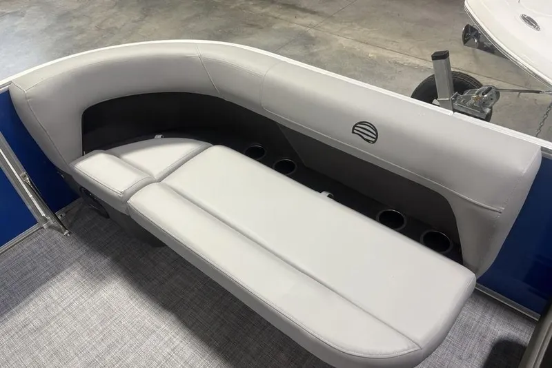 Slide: The Image of 2026 Sun Tracker Party Barge 16 DLX interior seating with cup holders. - 4