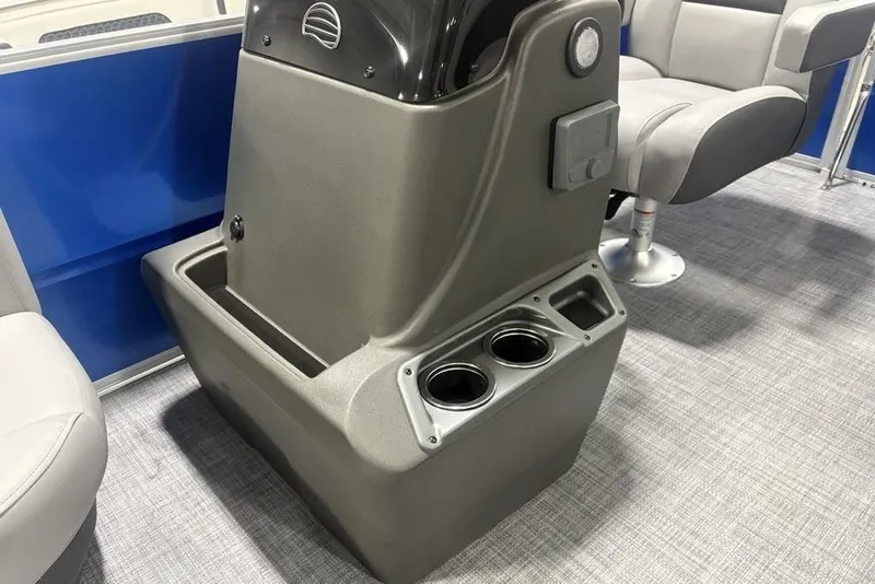 Slide: The Image of 2026 Sun Tracker Party Barge 16 DLX console with cup holders and seating. - 7