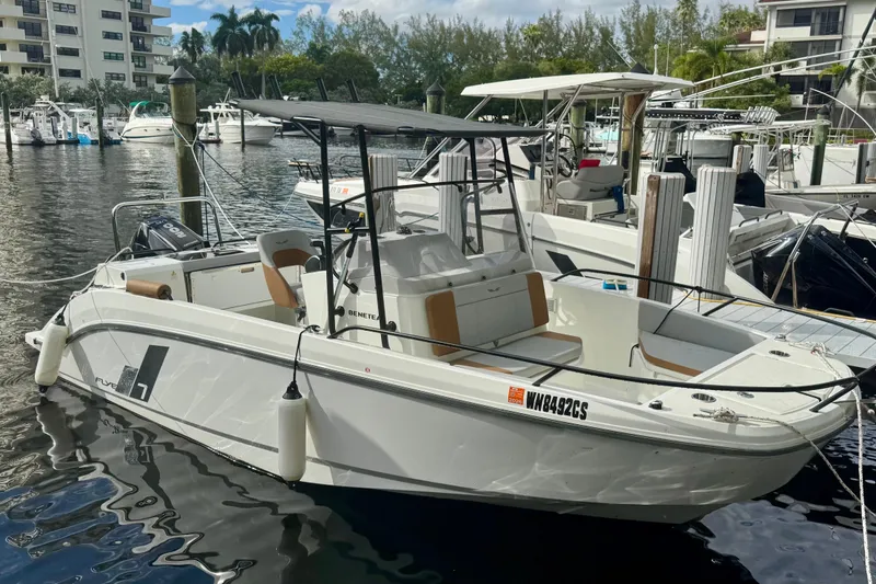 The Image of 2024 Beneteau Flyer 7 SPACEdeck boat docked in a marina. - 0